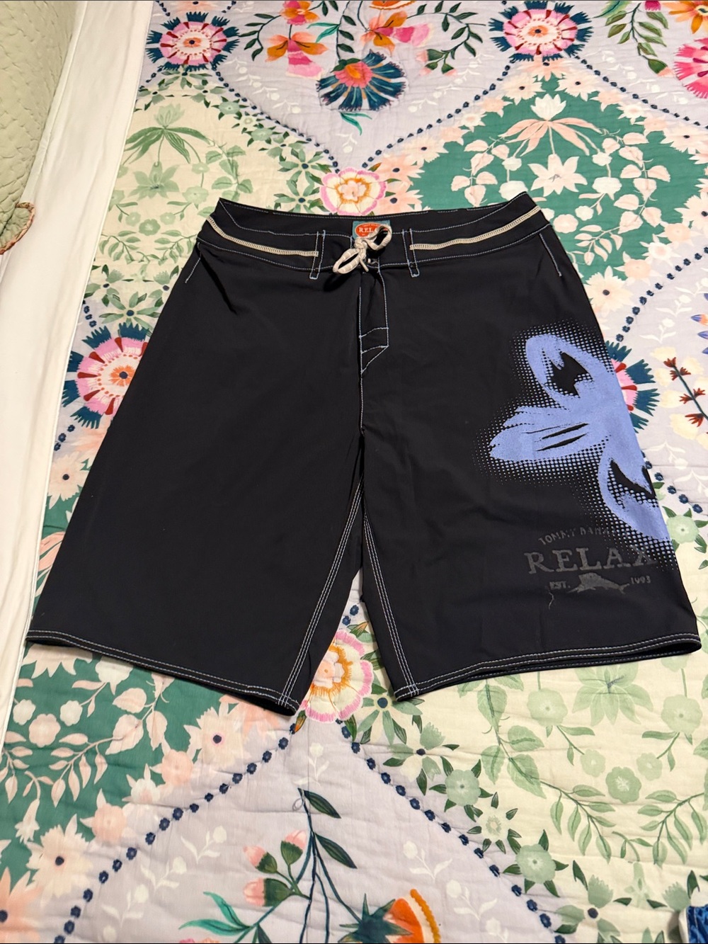 Tommy Bahama Black Board Shorts with Blue Floral Graphic